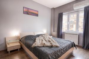 Ένα ή περισσότερα κρεβάτια σε δωμάτιο στο Your home away from home