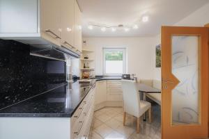 Dapur atau dapur kecil di CATO Ferienhaus +21 gambar