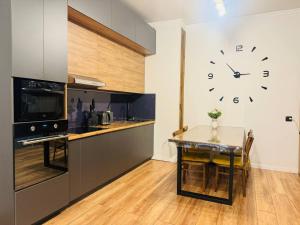 A kitchen or kitchenette at Infinity Estate Atameken
