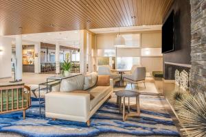 a living room with a couch and a table at Fairfield Inn & Suites Rolla in Rolla