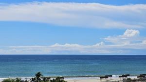 a view of the ocean from a beach at Casa Norte North Beach in Los Órganos