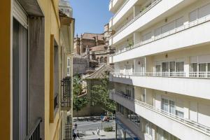a view of a street from an apartment building at Sara Love Downtown in Granada