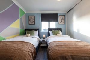 Postel nebo postele na pokoji v ubytování Relaxing - 2 Bedroom Flat with Parking
