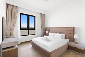 Fotografie z fotogalerie ubytování WelHome - Mesmerizing Sea & Burj Khalifa Views Apt at La Voile v Dubaji