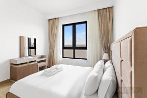 Fotografie z fotogalerie ubytování WelHome - Mesmerizing Sea & Burj Khalifa Views Apt at La Voile v Dubaji