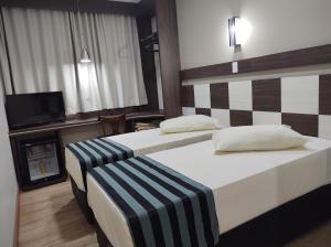 Katil atau katil-katil dalam bilik di Hotel Maestro Express +22 gambar