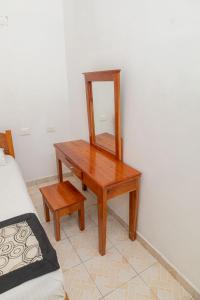 Postel nebo postele na pokoji v ubytování Hotel Las Palmas Cancun Centro