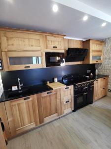 Kuchyň nebo kuchyňský kout v ubytování Duplex Les 2 Alpes avec accès direct aux pistes