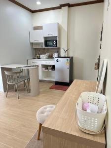 Kuchyň nebo kuchyňský kout v ubytování Kata Noi Place floor3