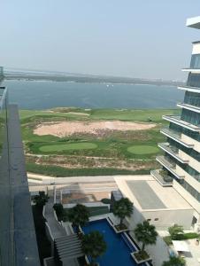 a view of a golf course from a building at Yas Getaway in Abu Dhabi