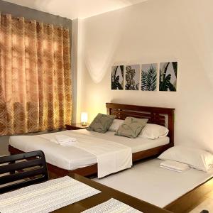 Postel nebo postele na pokoji v ubytování JORA Studio Apartment 1-C