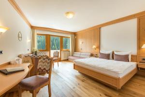 Postel nebo postele na pokoji v ubytování Hotel Christoph