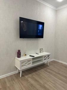 TV a/nebo společenská místnost v ubytování Luxe Apartment
