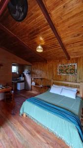 Postel nebo postele na pokoji v ubytování Cabanas Aconchego do Caboclo