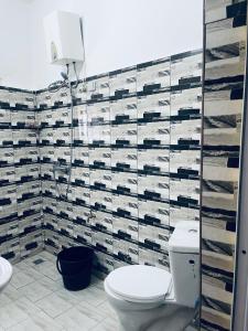 Koupelna v ubytování Immeuble Adam