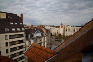 uitzicht op de stad vanaf het dak van een gebouw bij Le Molsheim - Grand appartement proche Musée dArt Moderne in Straatsburg