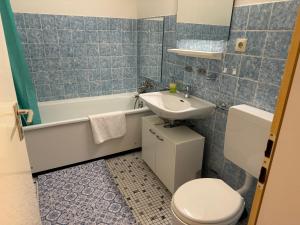 Koupelna v ubytování Steinhauer Business Appartement + 14 fotografií