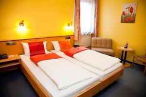 Postel nebo postele na pokoji v ubytování Hotel bei Liebe's