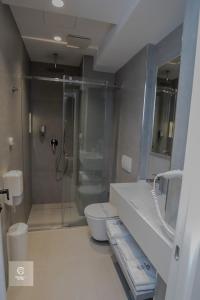 Koupelna v ubytování Central Inn Hotel