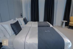 Postel nebo postele na pokoji v ubytování Central Inn Hotel