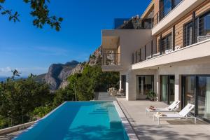 an image of a house with a swimming pool at Luxury Villa La Mirada in Omiš