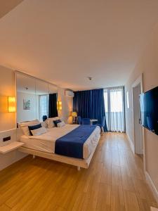 Postel nebo postele na pokoji v ubytování Batumi floor40