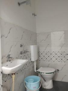 Ένα μπάνιο στο RELAX INN By MARIGOLD FAMILY Guest House