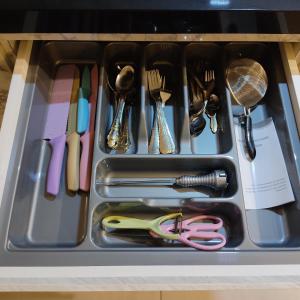 a tray filled with utensils in a drawer at URBAN SUITES JSW STUDIO 3 ROOMS COMMERCIAL CONDO in Jelutong