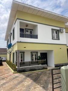 una representación de una casa con entrada en Apartment by Grace wheel, en Abeokuta