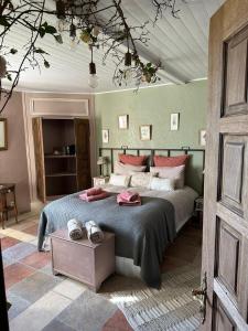 Posteľ alebo postele v izbe v ubytovaní La demeure des poètes chambres d'hôtes