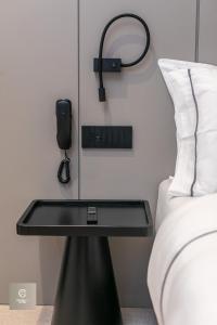 Postel nebo postele na pokoji v ubytování Central Inn Hotel
