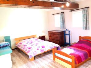 Postel nebo postele na pokoji v ubytování Maison charmante à Cruas + Piscine