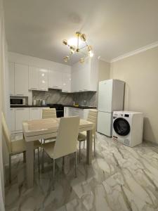 Η κουζίνα ή μικρή κουζίνα στο Аэропорт "EUGEN DOGA"-КИШИНЭУ +28 φωτογραφίες