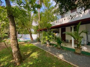 Zahrada ubytování Villa Araliya