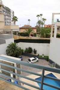 a car parked on the balcony of a building at Apartamento el Cid in Calpe