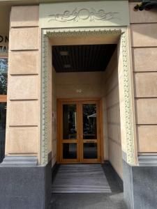a entrance to a building with a wooden door at ESPOLON LUXURY 10 in Logroño