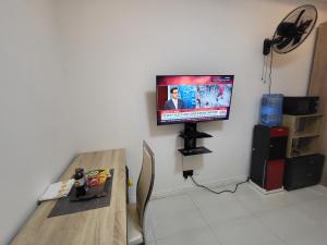 Sjónvarps- og/eða afþreyingartæki á Ikoyi/Banana Studio Room