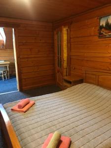 Postel nebo postele na pokoji v ubytování Trembita готель