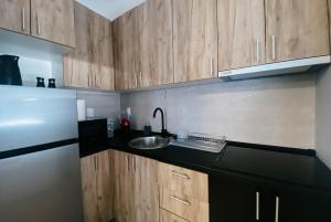 Kuhinja oz. manjša kuhinja v nastanitvi Apartmani Milan