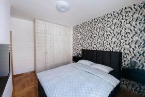Postelja oz. postelje v sobi nastanitve Apartmani Milan
