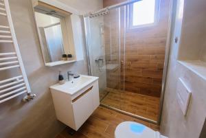 Kopalnica v nastanitvi Apartmani Milan