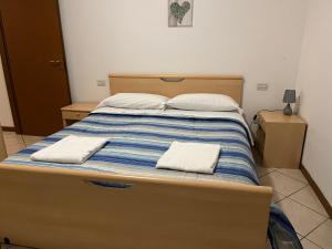A bed or beds in a room at Apartment Orio 4