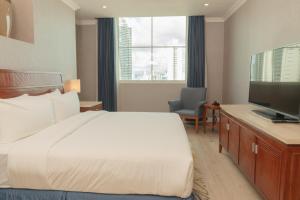 Uma TV ou centro de entretenimento em Waymore Hotel Spa & Casino