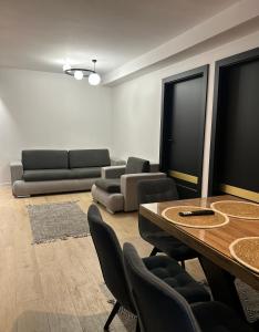 Leśne Wzgórze Apartamenty的休息区