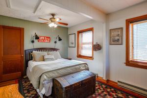 a bedroom with a bed and a ceiling fan at Sunset View in Hazelhurst