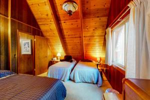 Voodi või voodid majutusasutuse Tranquil Treehouse Haven toas