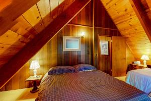 Voodi või voodid majutusasutuse Tranquil Treehouse Haven toas