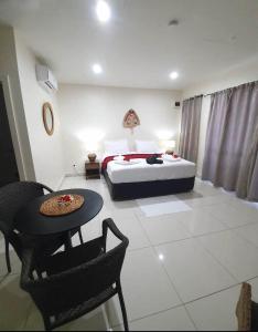 Wolfgramm Beachfront Motel客房内的一张或多张床位