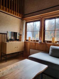 Posezení v ubytování Cozy mountain house in Jämtland