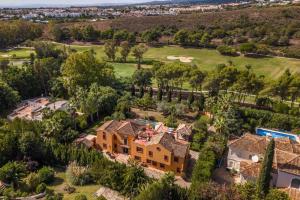 an aerial view of a house with a yard at Casa del Paraiso in Estepona